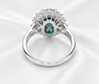 Oval Teal Sapphire & Diamond Halo Ring – 14K White Gold